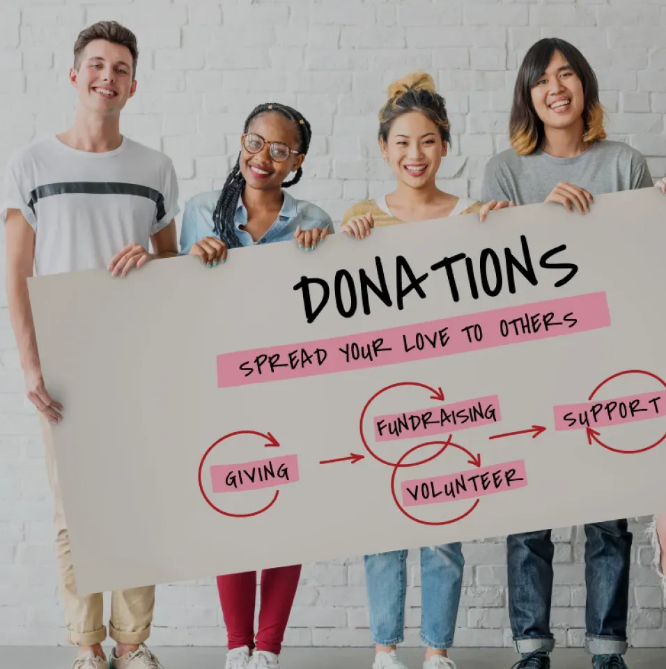 Hands holding a donation envelope